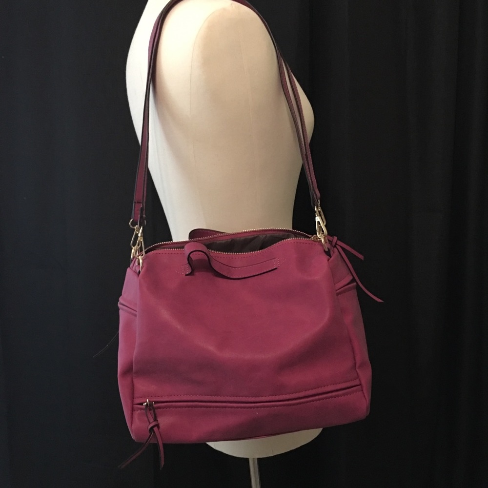 Rose adjustable strap purse.